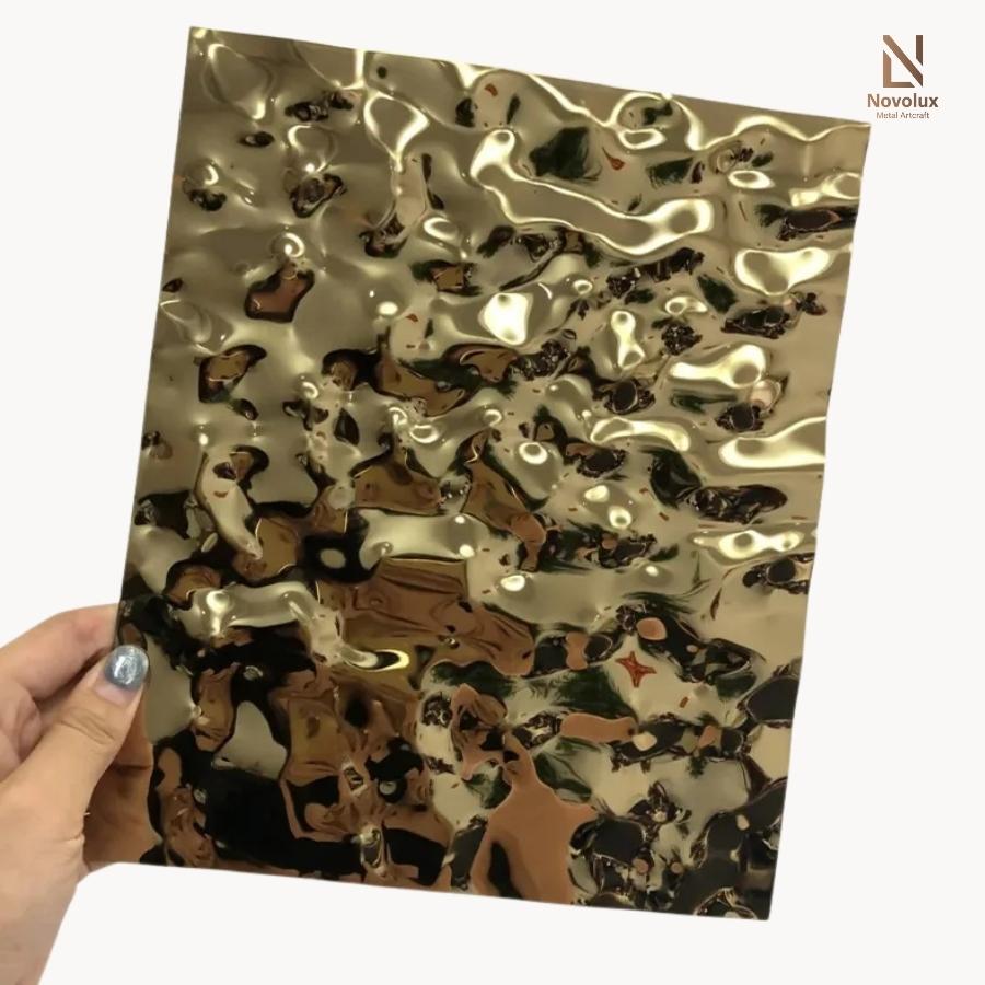tấm inox vân sóng nước màu vàng gold